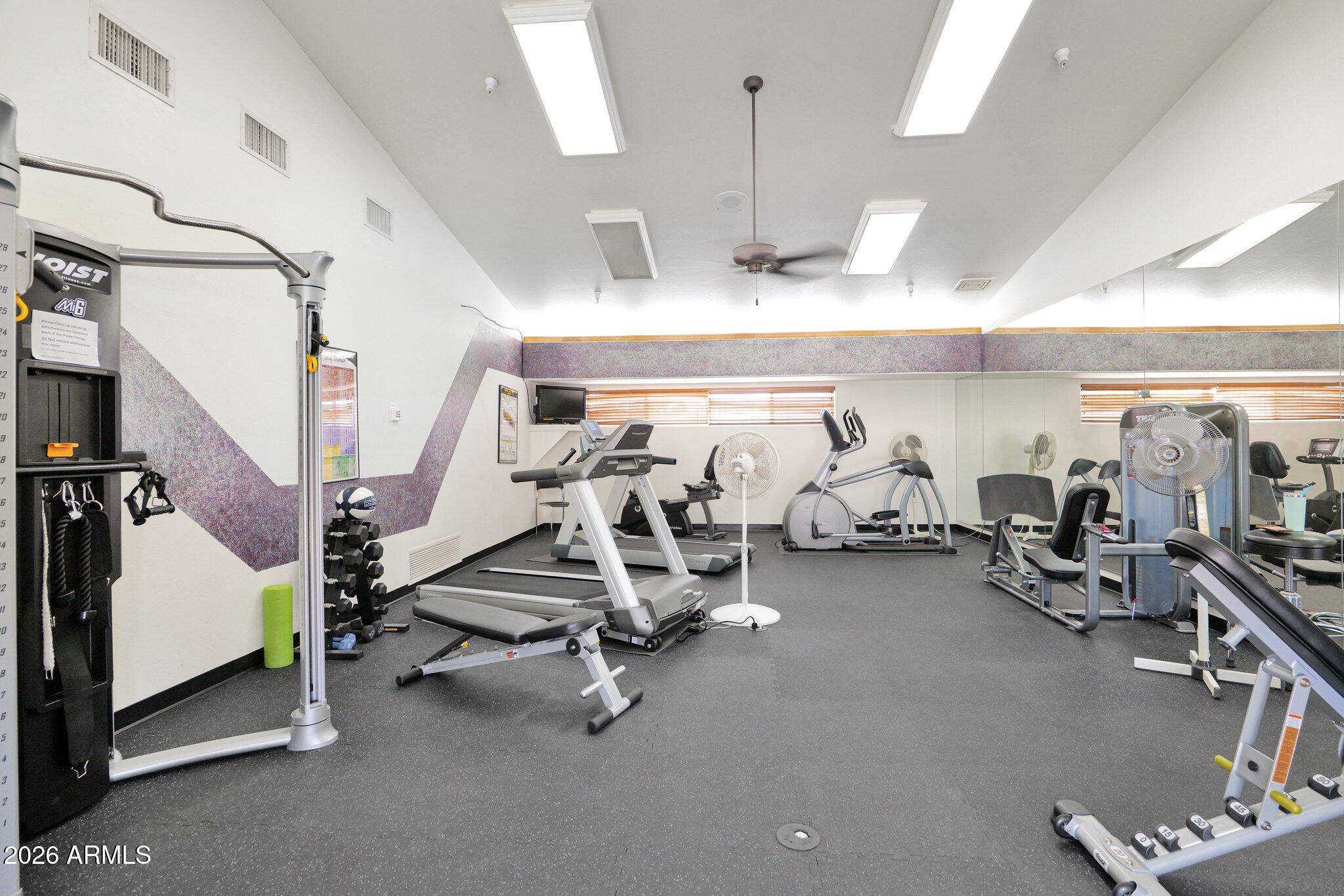 5830 East McKellips Road, Unit 110 Mesa, AZ 85215 - Photo 45 of 45 a view of a room with gym equipment