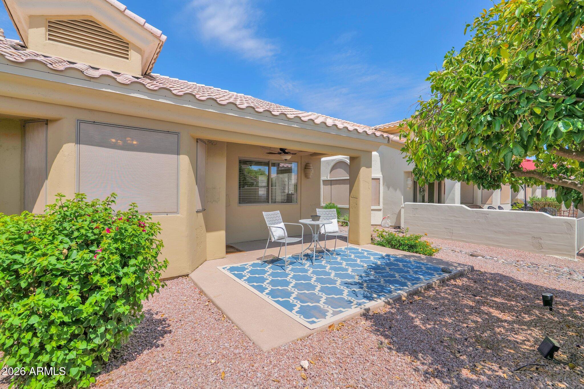 5830 East McKellips Road, Unit 110 Mesa, AZ 85215 - Photo 6 of 45 a view of a house with a porch