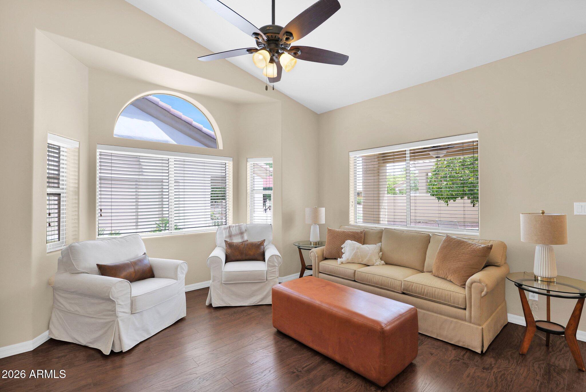 5830 East McKellips Road, Unit 110 Mesa, AZ 85215 - Photo 10 of 45 a living room with furniture and a large window
