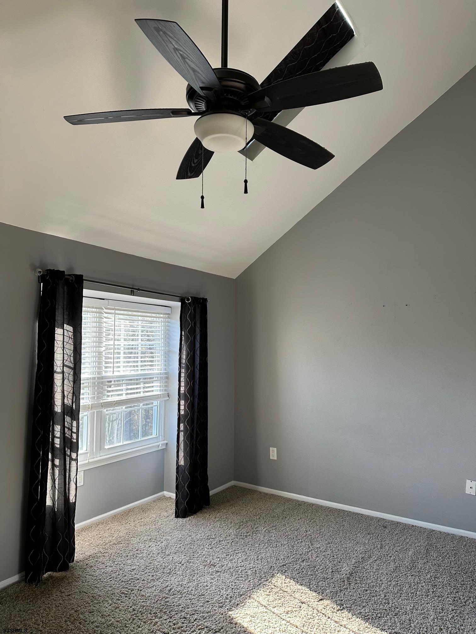 19 Cedar Court Somers Point, NJ 08244 - Photo 12 of 20 an empty room with ceiling fan and windows