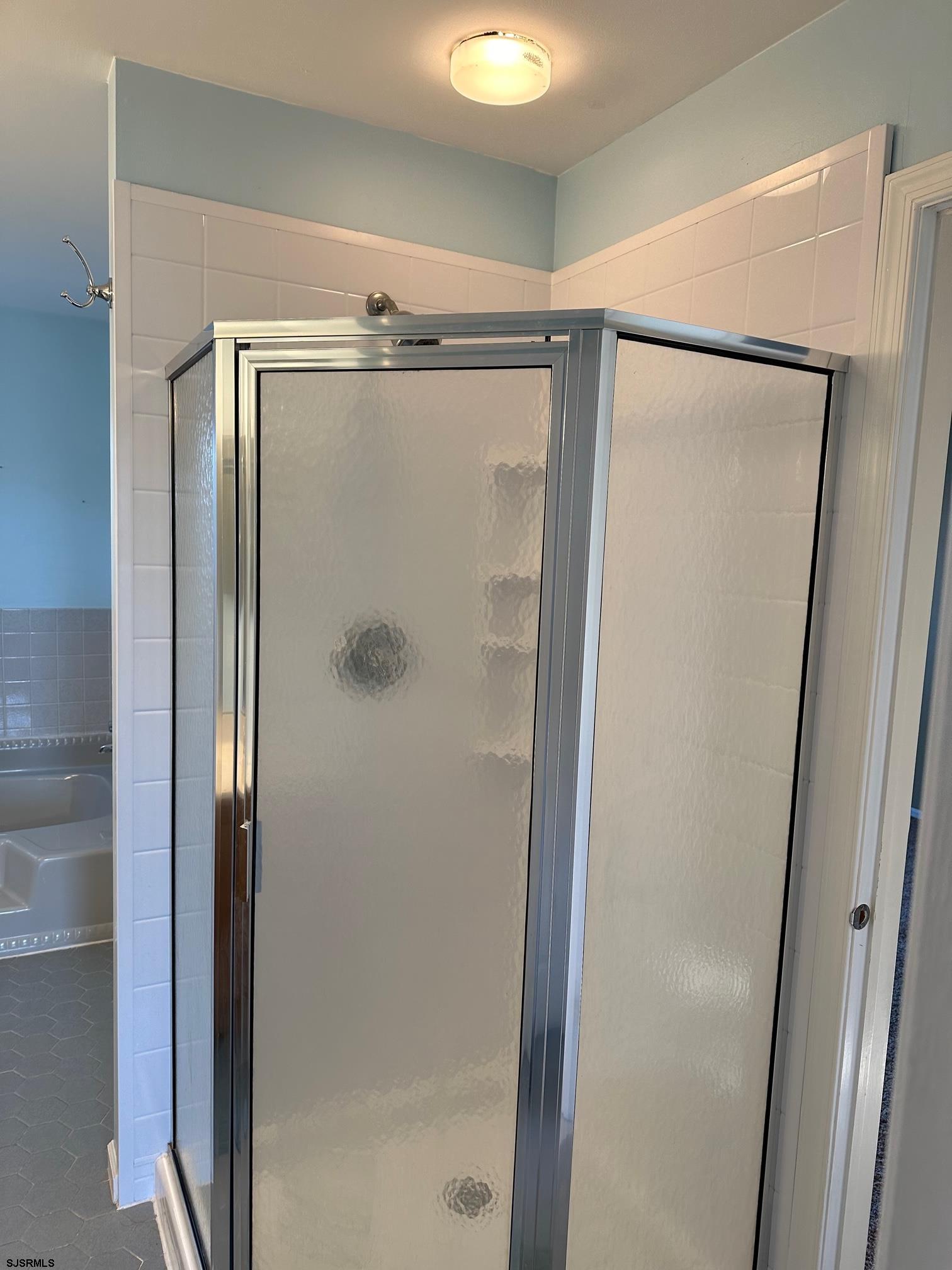 19 Cedar Court Somers Point, NJ 08244 - Photo 6 of 20 a bathroom with a glass shower door