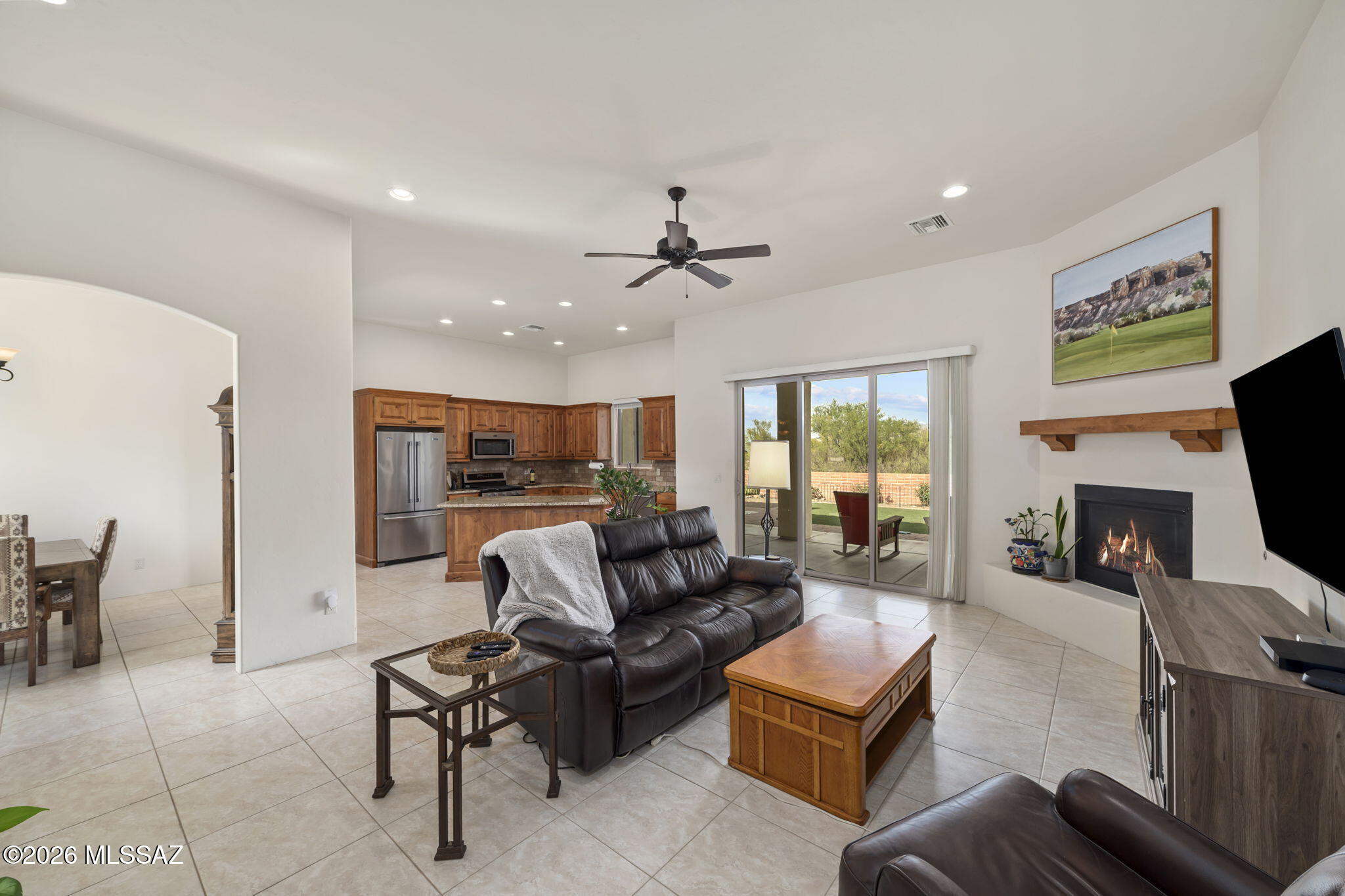 45 High View Court Tubac, AZ 85646 - Photo 20 of 44 a living room with furniture kitchen view and a flat screen tv