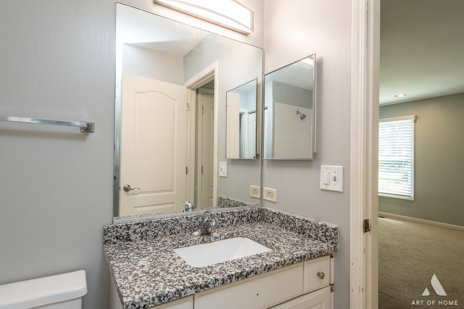 61 Willow Parkway Buffalo Grove, IL 60089 - Photo 25 of 34 a bathroom with a granite countertop sink and a mirror