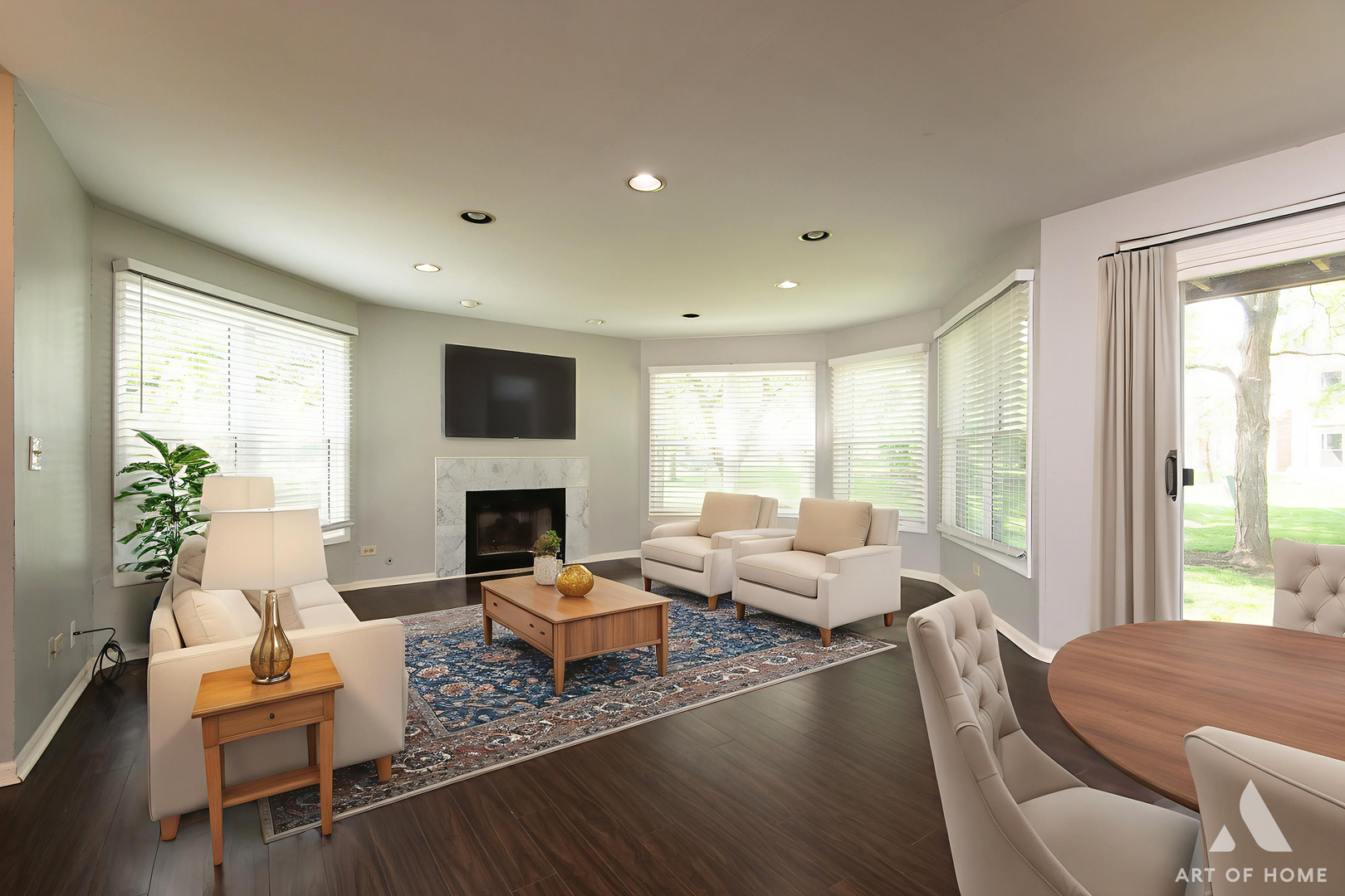 61 Willow Parkway Buffalo Grove, IL 60089 - Photo 7 of 34 a living room with furniture fireplace and a large window