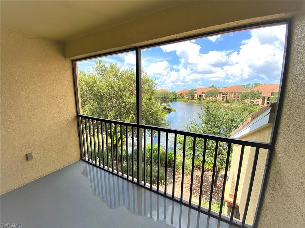 7965 Preserve Circle, Unit 734 Naples, FL 34119 - Photo 18 of 20 a view of a city from a balcony