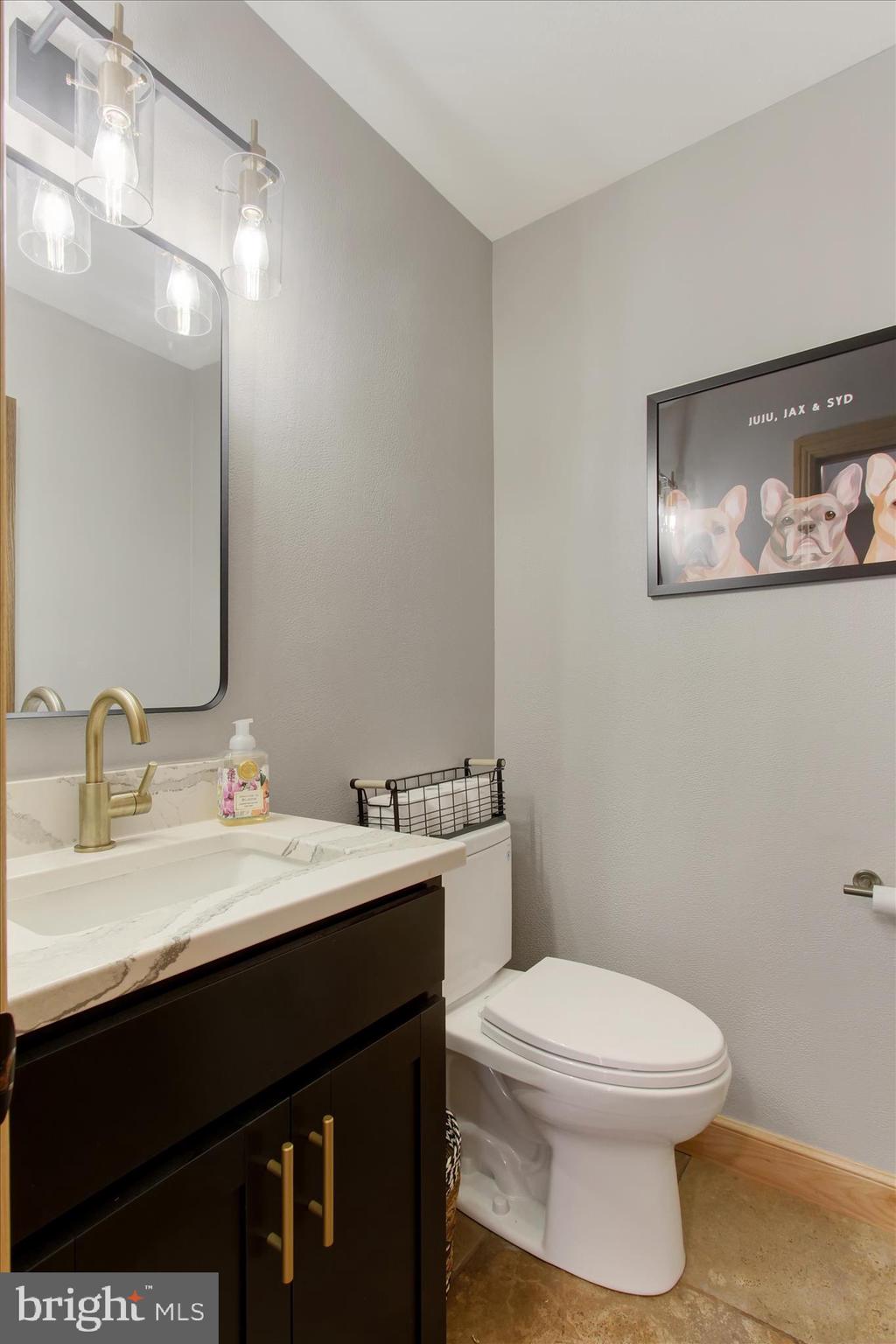 1855 Westwood Road York, PA 17403 - Photo 22 of 60 a bathroom with a sink vanity mirror and toilet