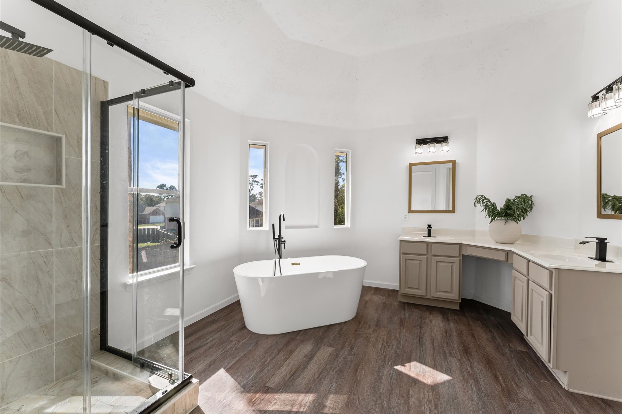Spa-inspired primary bath with modern design; an incredible value for the price.