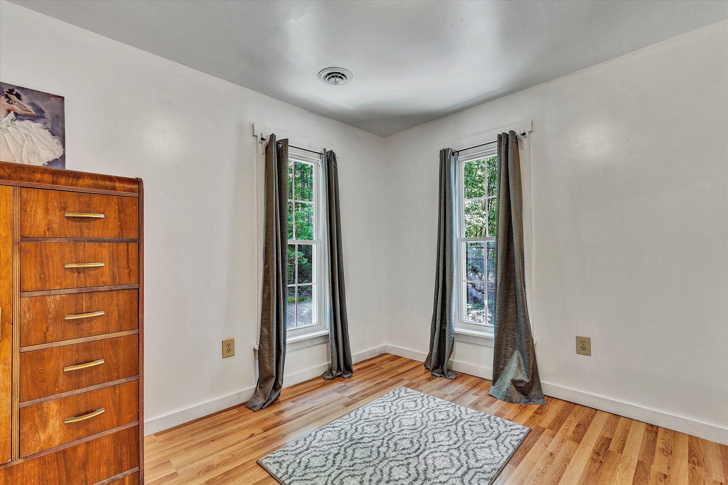 2270 Pico Road Buchanan, VA 24066 - Photo 14 of 47 a view of an empty room with window and wooden floor