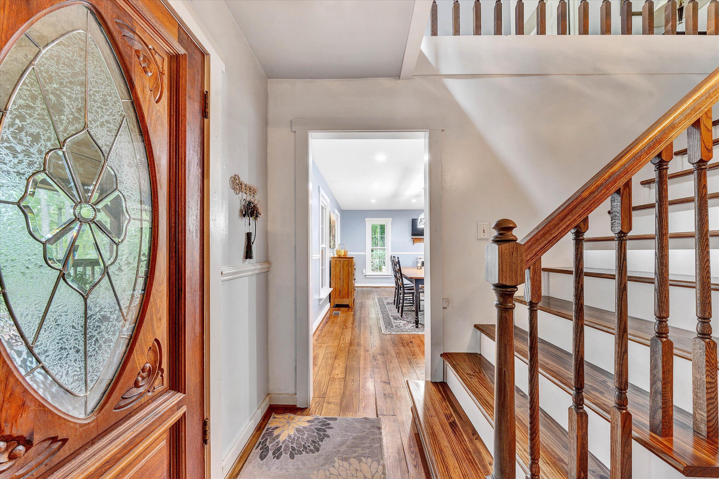 2270 Pico Road Buchanan, VA 24066 - Photo 15 of 47 a view of a hallway with wooden floor and staircase