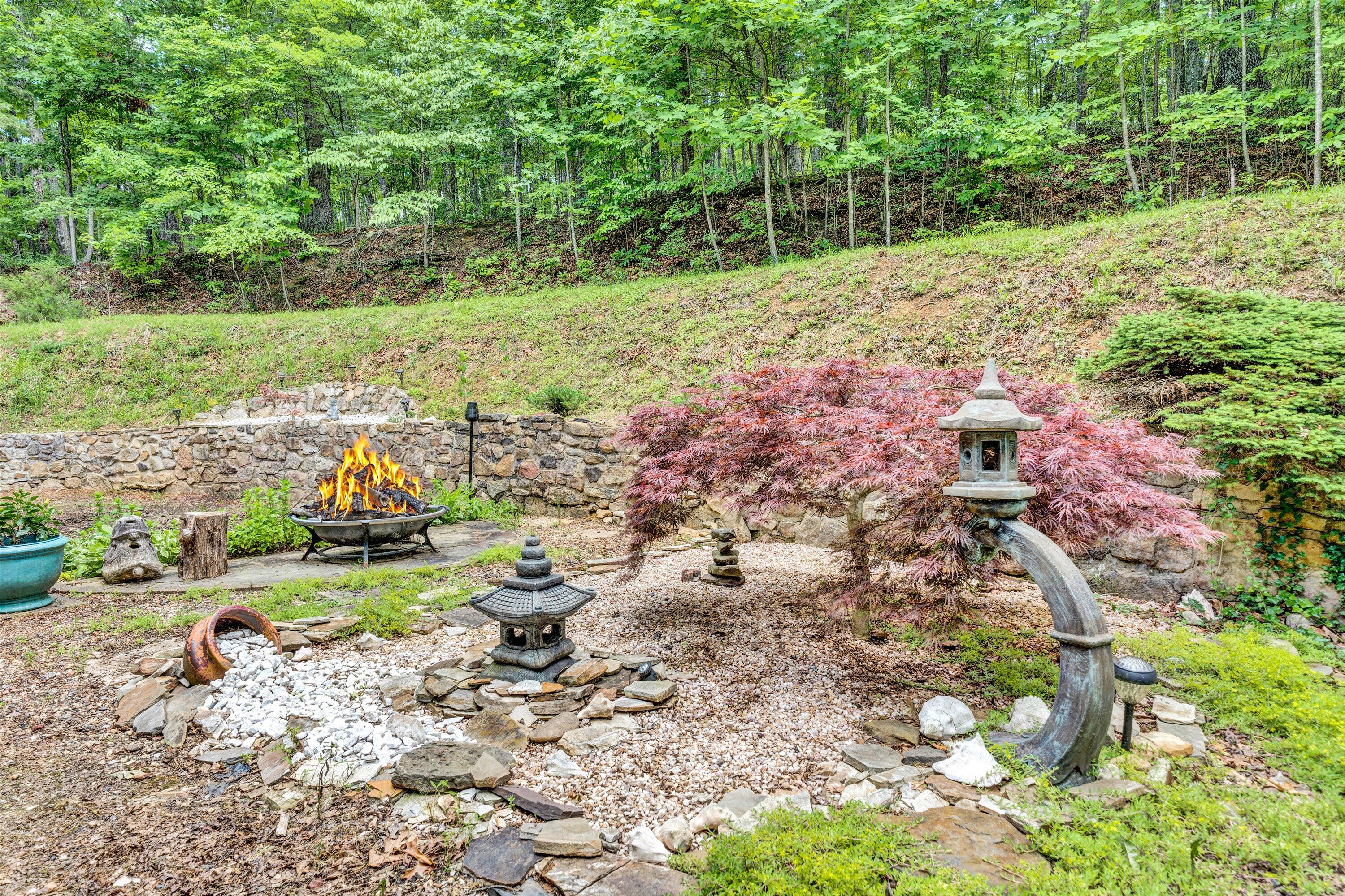 2270 Pico Road Buchanan, VA 24066 - Photo 34 of 47 a view of a yard with plants and large trees