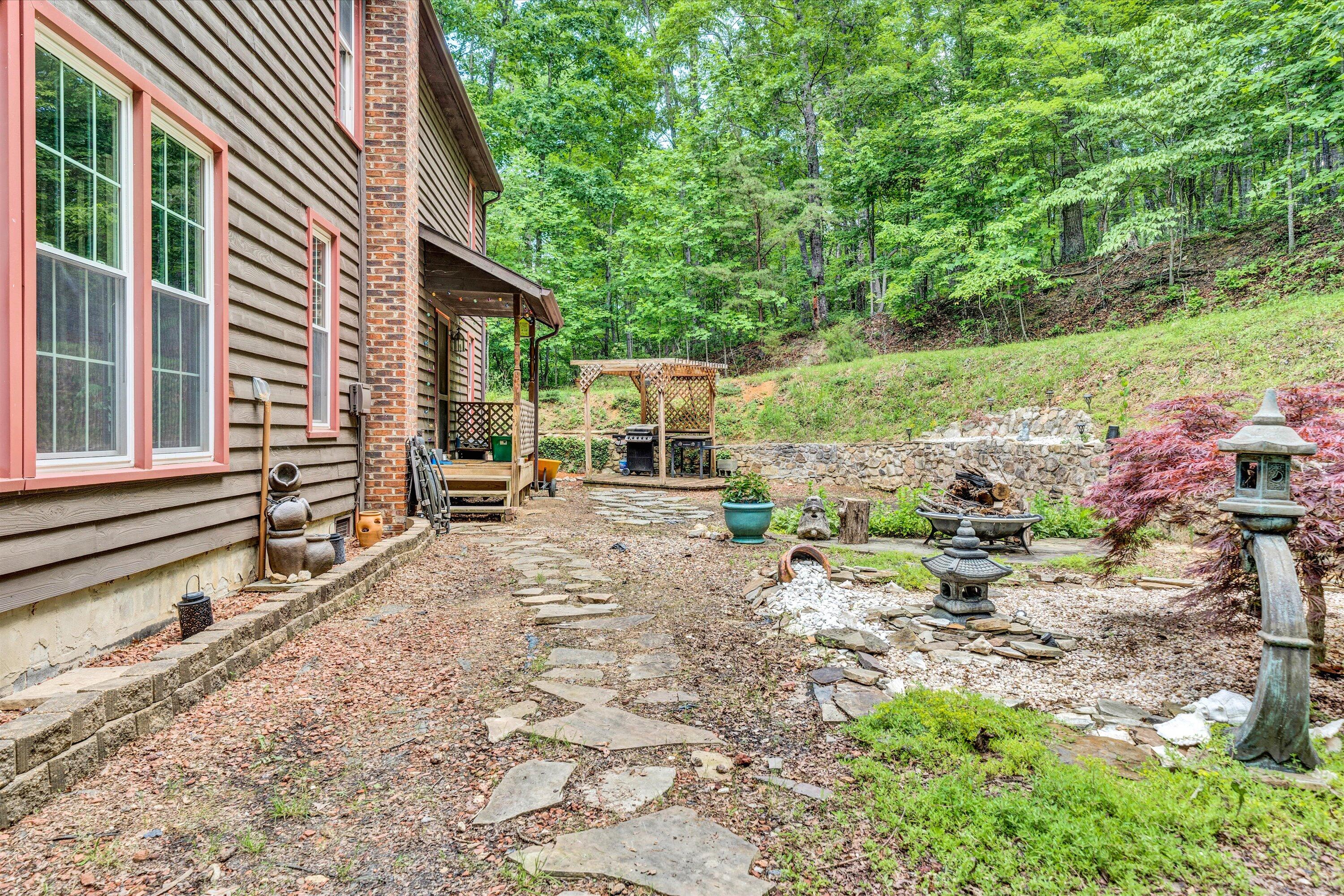 2270 Pico Road Buchanan, VA 24066 - Photo 38 of 47 a view of a house with a yard and sitting area