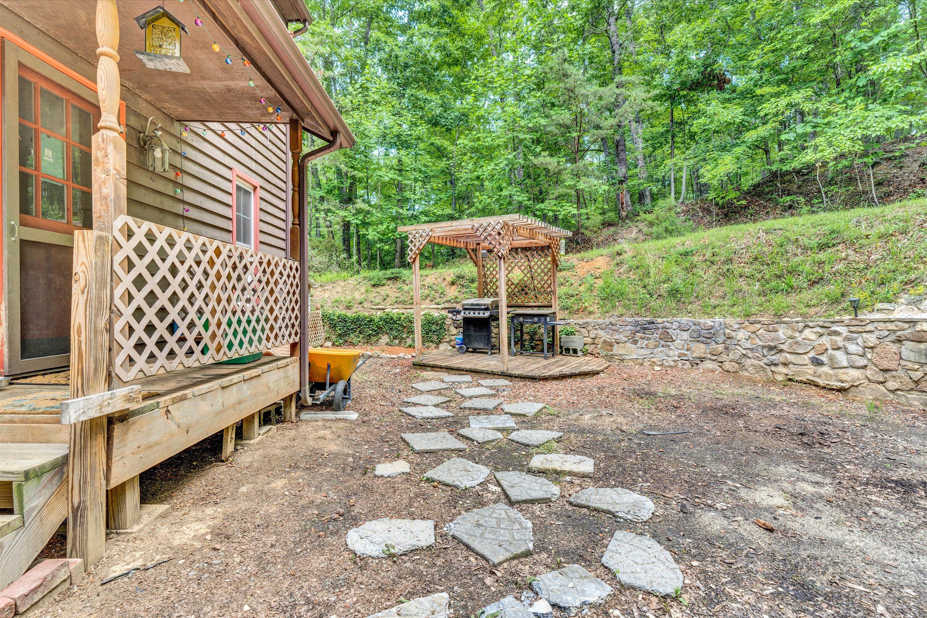 2270 Pico Road Buchanan, VA 24066 - Photo 39 of 47 a bench is sitting in the middle of a yard
