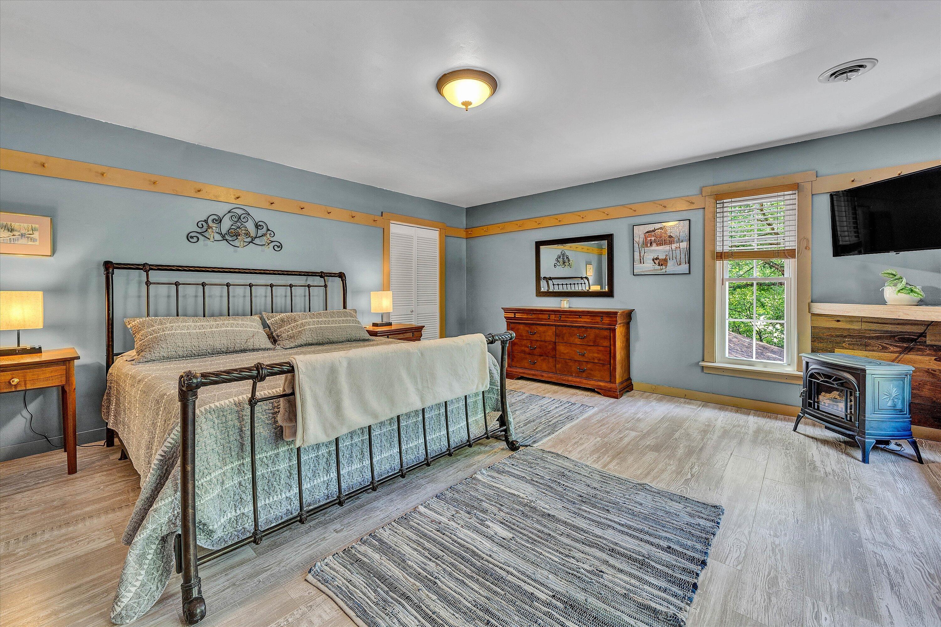 2270 Pico Road Buchanan, VA 24066 - Photo 8 of 47 a bedroom with a bed and a flat screen tv