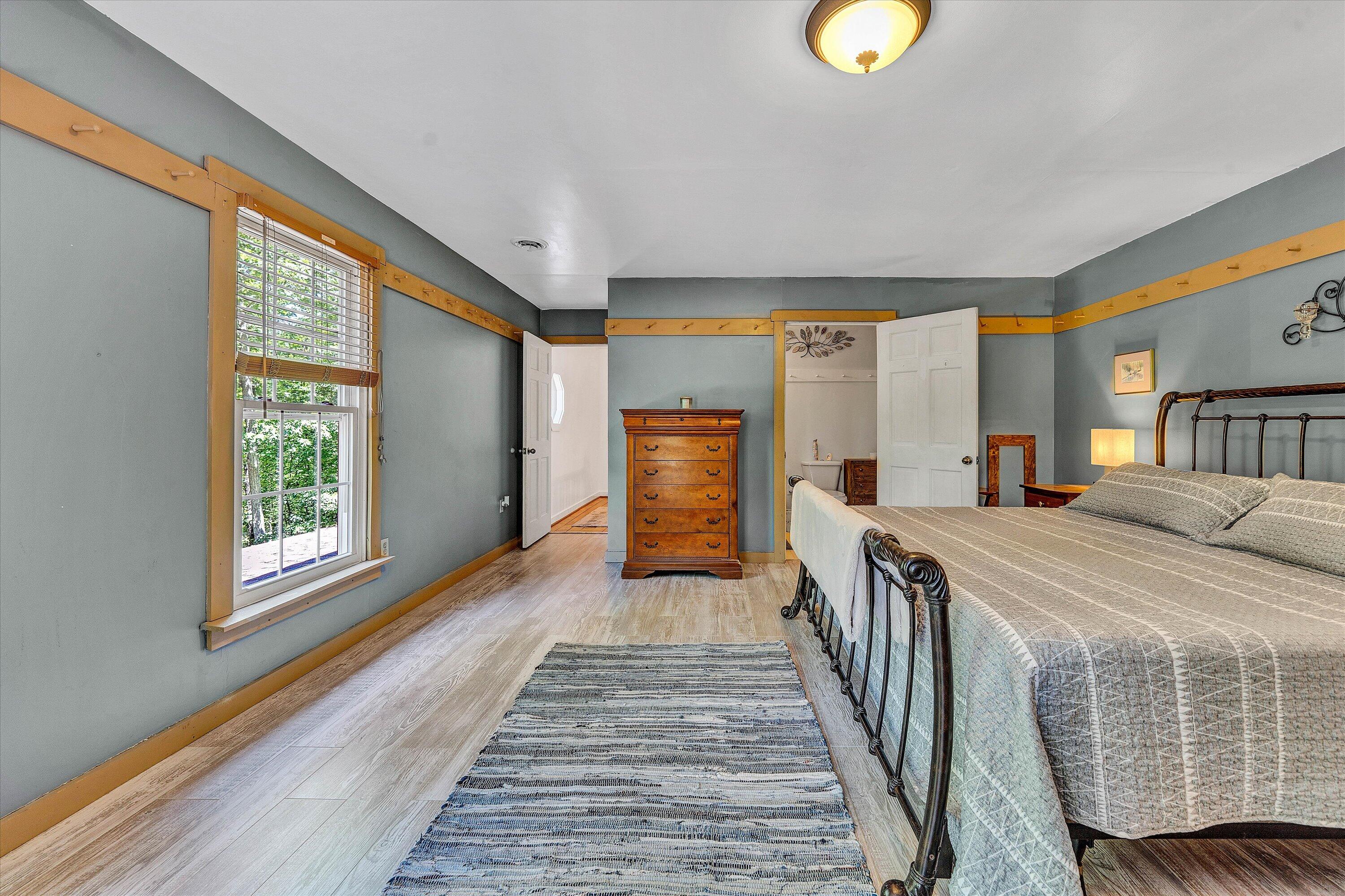 2270 Pico Road Buchanan, VA 24066 - Photo 10 of 47 a bedroom with bed and wooden floor
