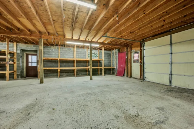 a view of an empty room with a balcony