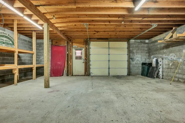 a view of a room with wooden walls