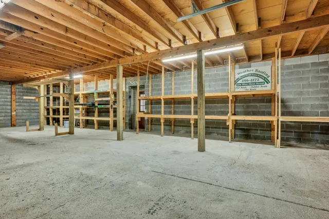 a view of an empty room with a balcony