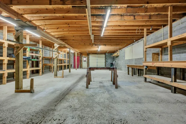 a view of a big room with windows