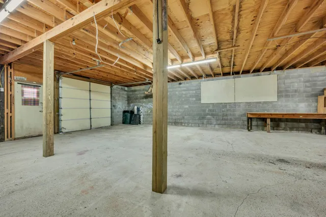 a view of a room with wooden walls