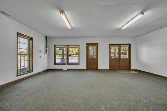 an empty room with windows