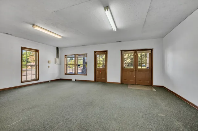 an empty room with windows