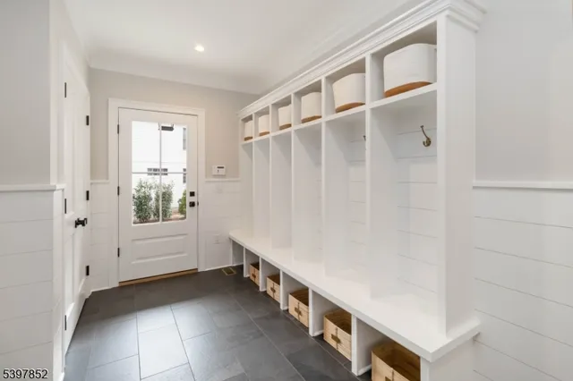 a workspace with furniture and a window