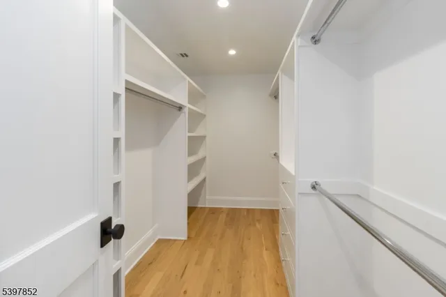 a bathroom with a tub and shower