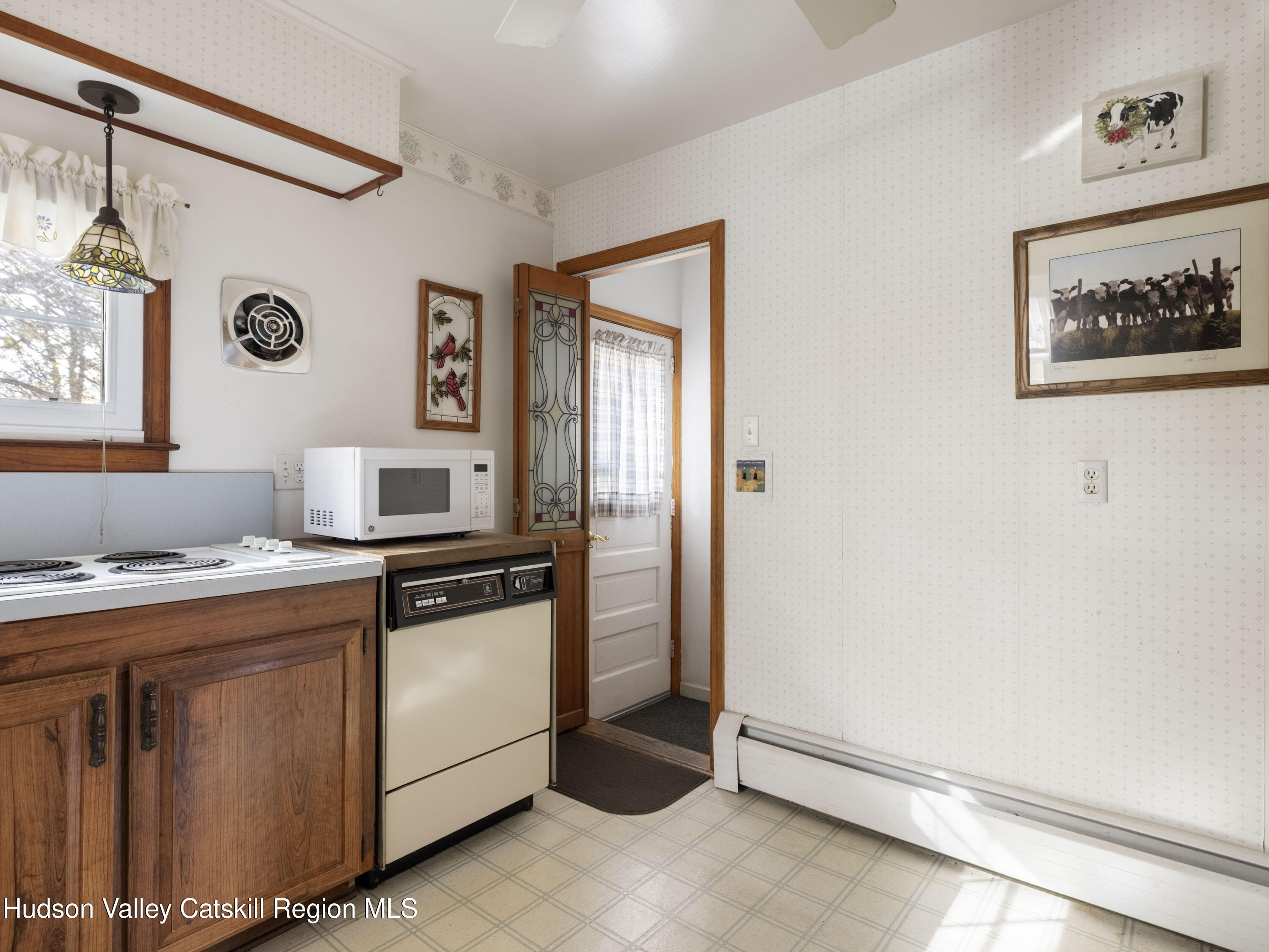 252 Highway 199 Red Hook, NY 12571 - Photo 12 of 45 a kitchen with stainless steel appliances granite countertop a stove and a refrigerator