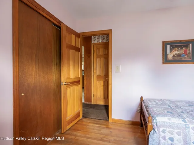 a view of a bathroom from a hallway