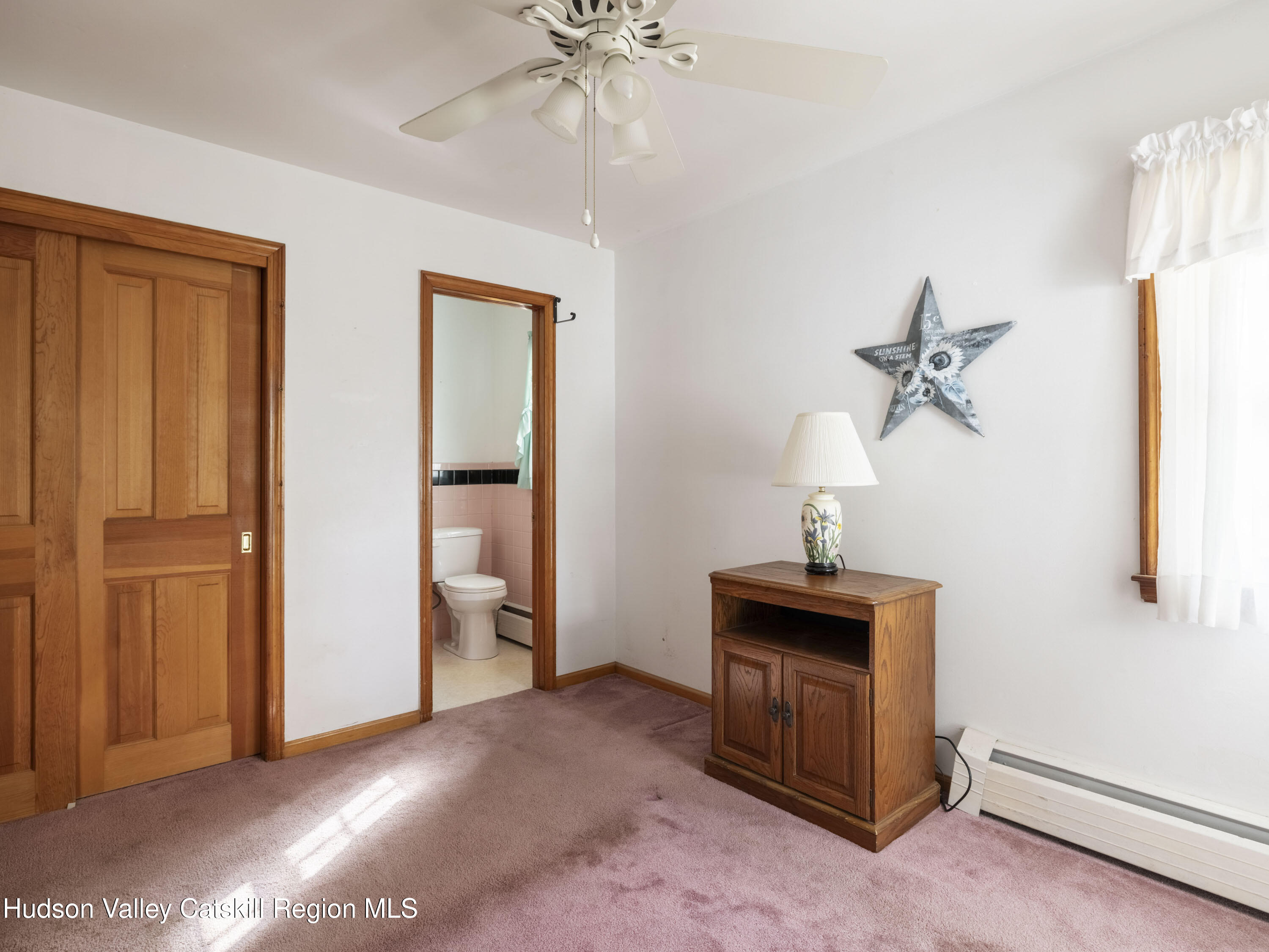 252 Highway 199 Red Hook, NY 12571 - Photo 17 of 45 a view of a livingroom with furniture and chandelier fan