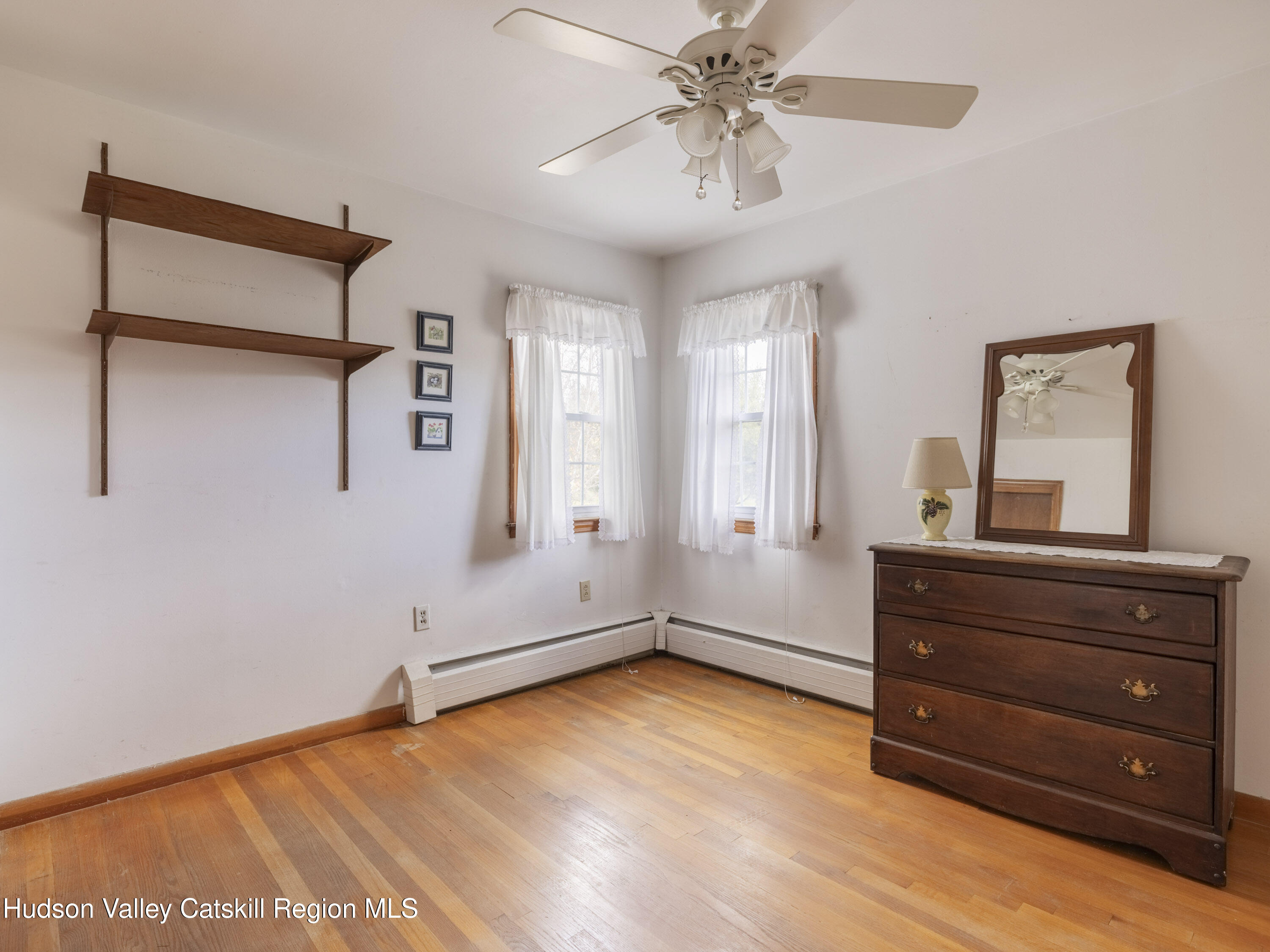 252 Highway 199 Red Hook, NY 12571 - Photo 21 of 45 wooden floor in an empty room with a window