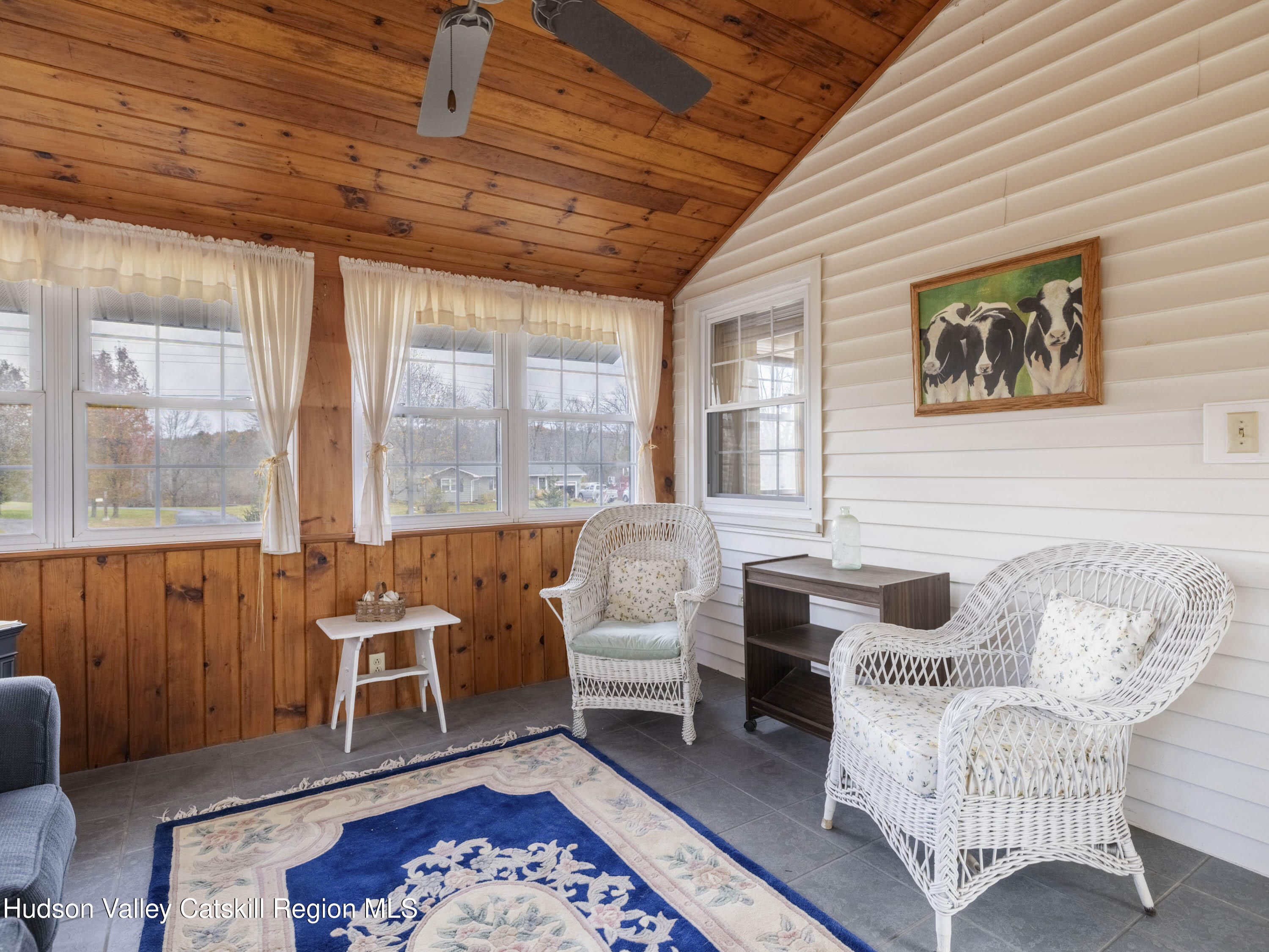 252 Highway 199 Red Hook, NY 12571 - Photo 27 of 45 a living room with furniture and a large window