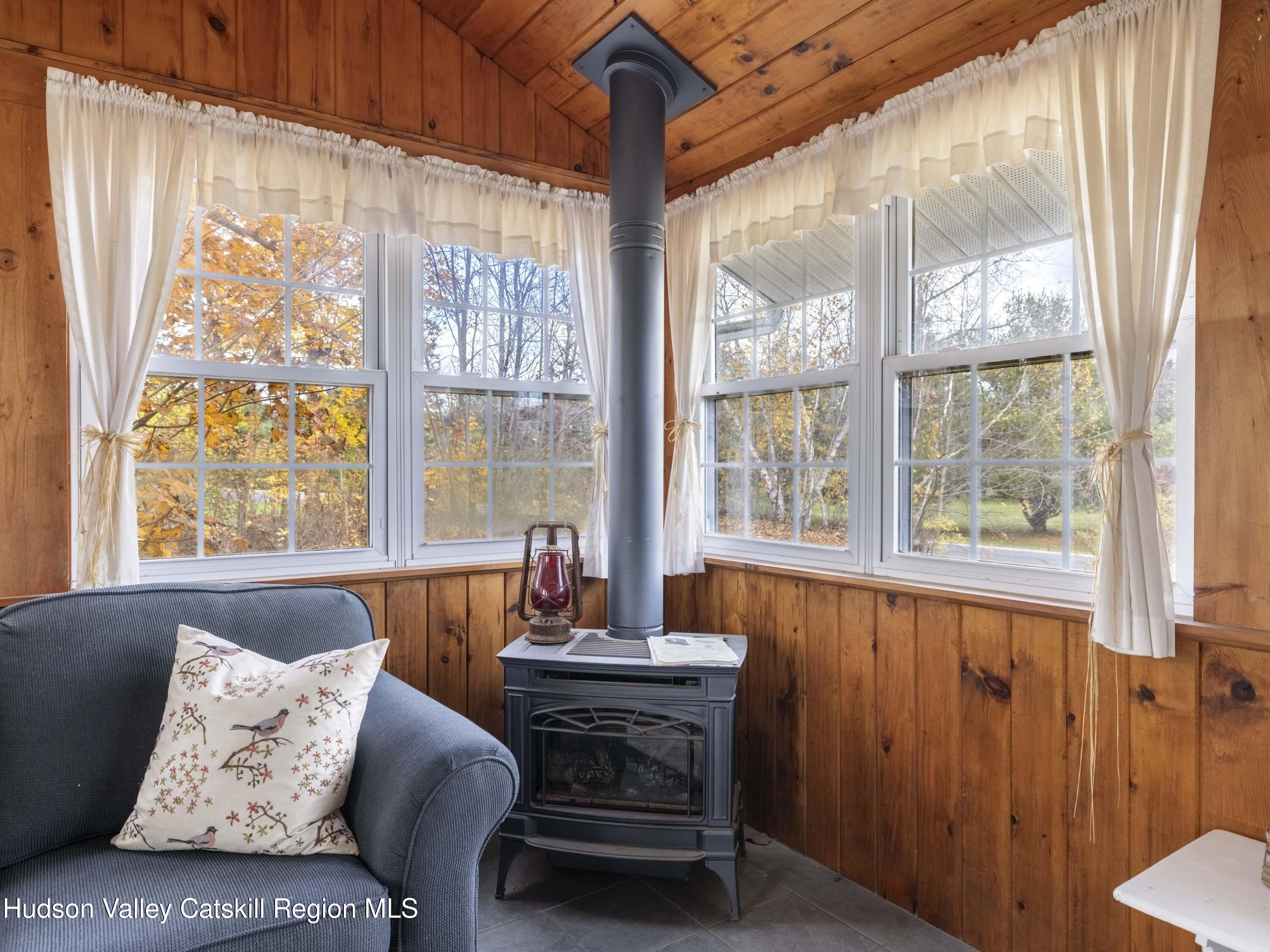 252 Highway 199 Red Hook, NY 12571 - Photo 28 of 45 a living room with furniture and large windows