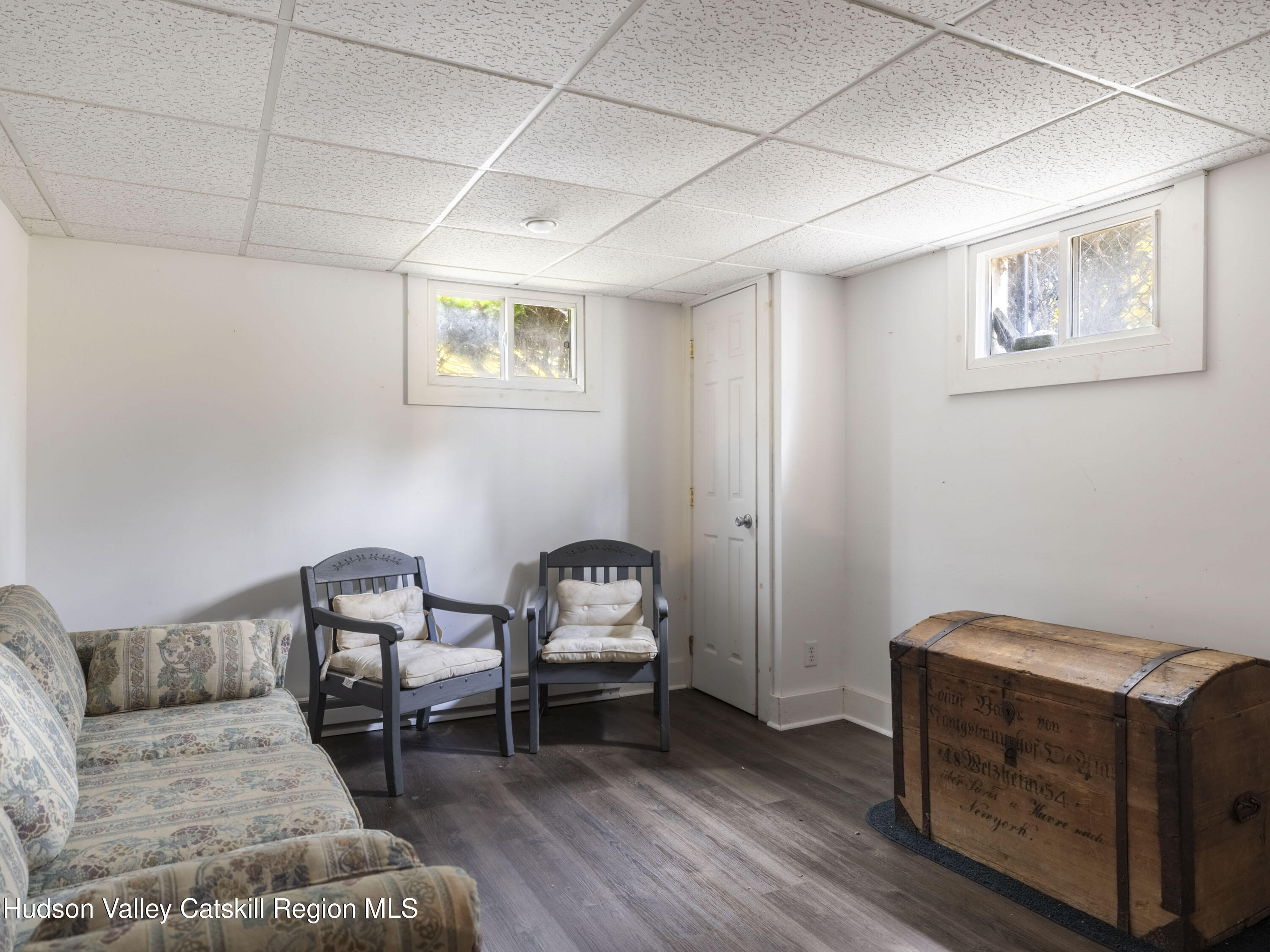 252 Highway 199 Red Hook, NY 12571 - Photo 30 of 45 a living room with furniture and a wooden floor