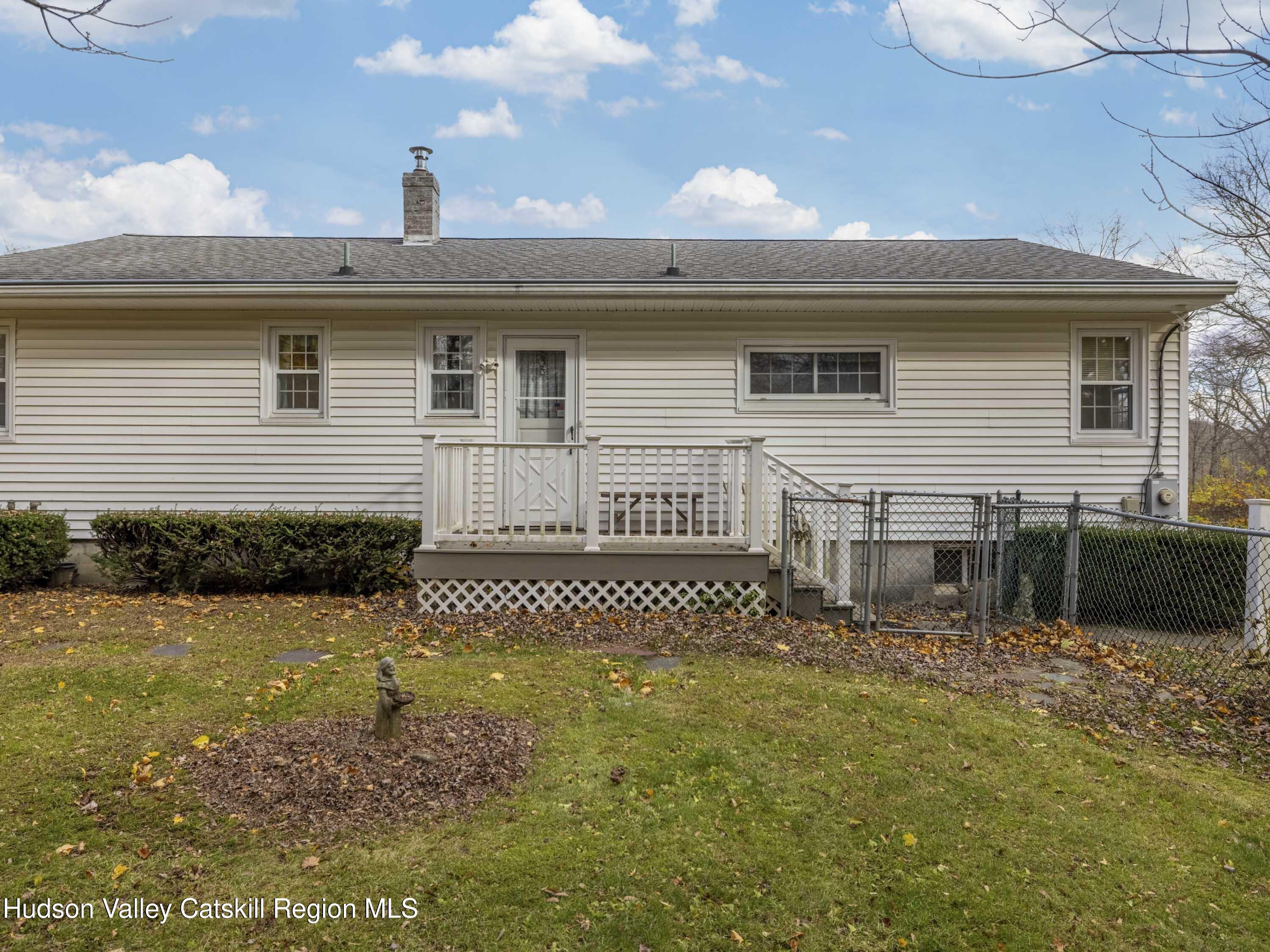 252 Highway 199 Red Hook, NY 12571 - Photo 31 of 45 a front view of a house with a garden
