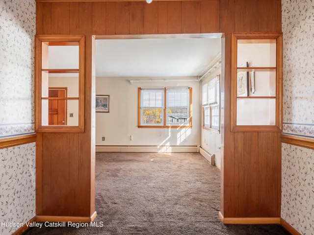 view of an empty room with a window