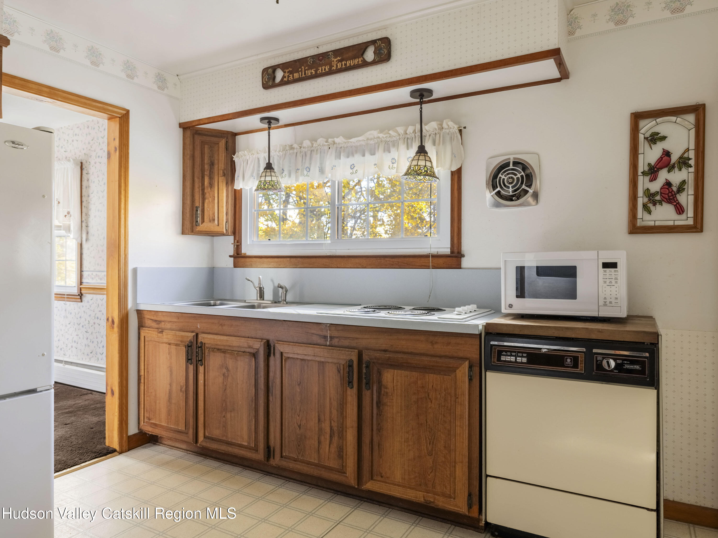 252 Highway 199 Red Hook, NY 12571 - Photo 9 of 45 a kitchen with stainless steel appliances a sink stove and refrigerator