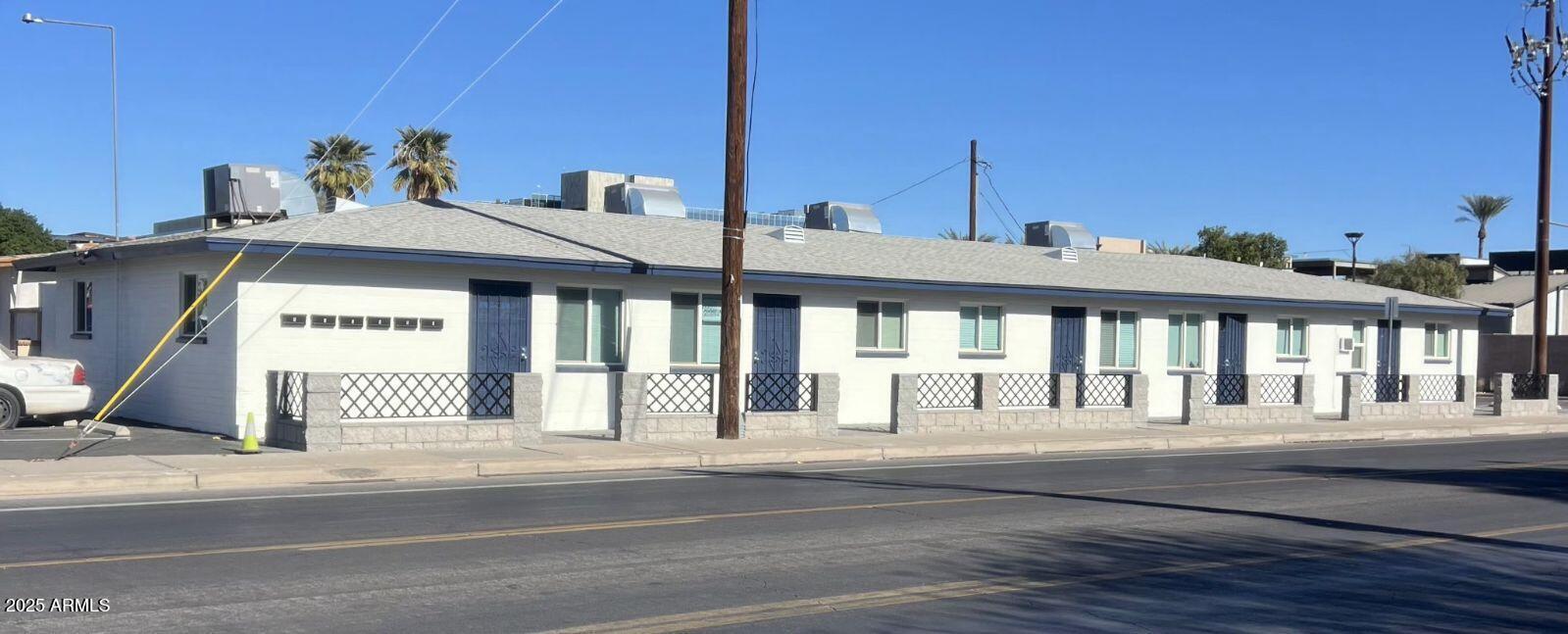 299 South Oregon Street, Unit 4 Chandler, AZ 85225 - Photo 1 of 39 a front view of a house with a garden