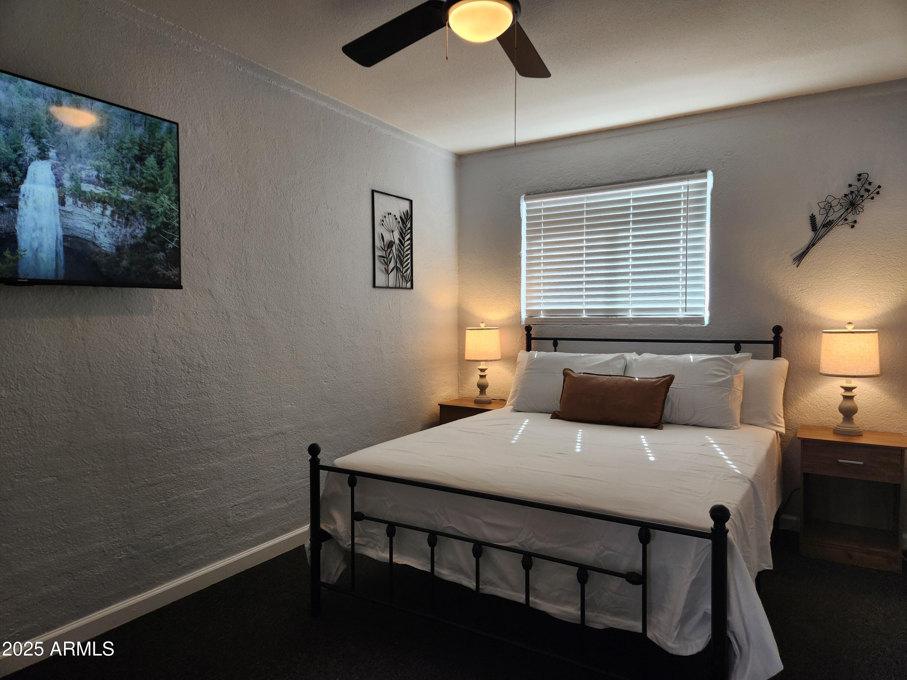 299 South Oregon Street, Unit 4 Chandler, AZ 85225 - Photo 19 of 39 a bedroom with a bed and a window