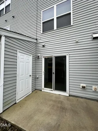 a view of a house with white door