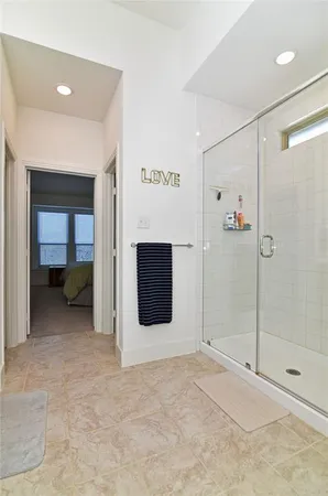 a view of a hallway with a room