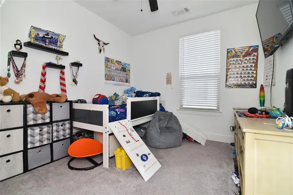 a room with furniture and toys