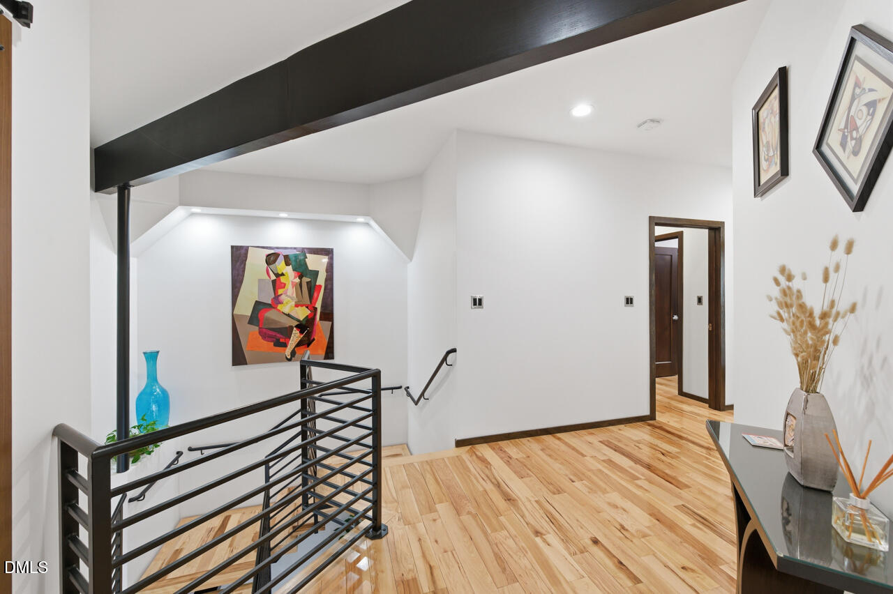3315 Denada Path Durham, NC 27707 - Photo 26 of 74 a view of a hallway with wooden floor and furniture