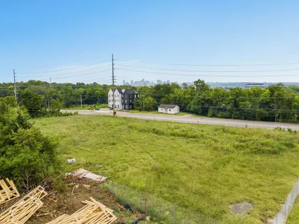 a view of a lake with a big yard
