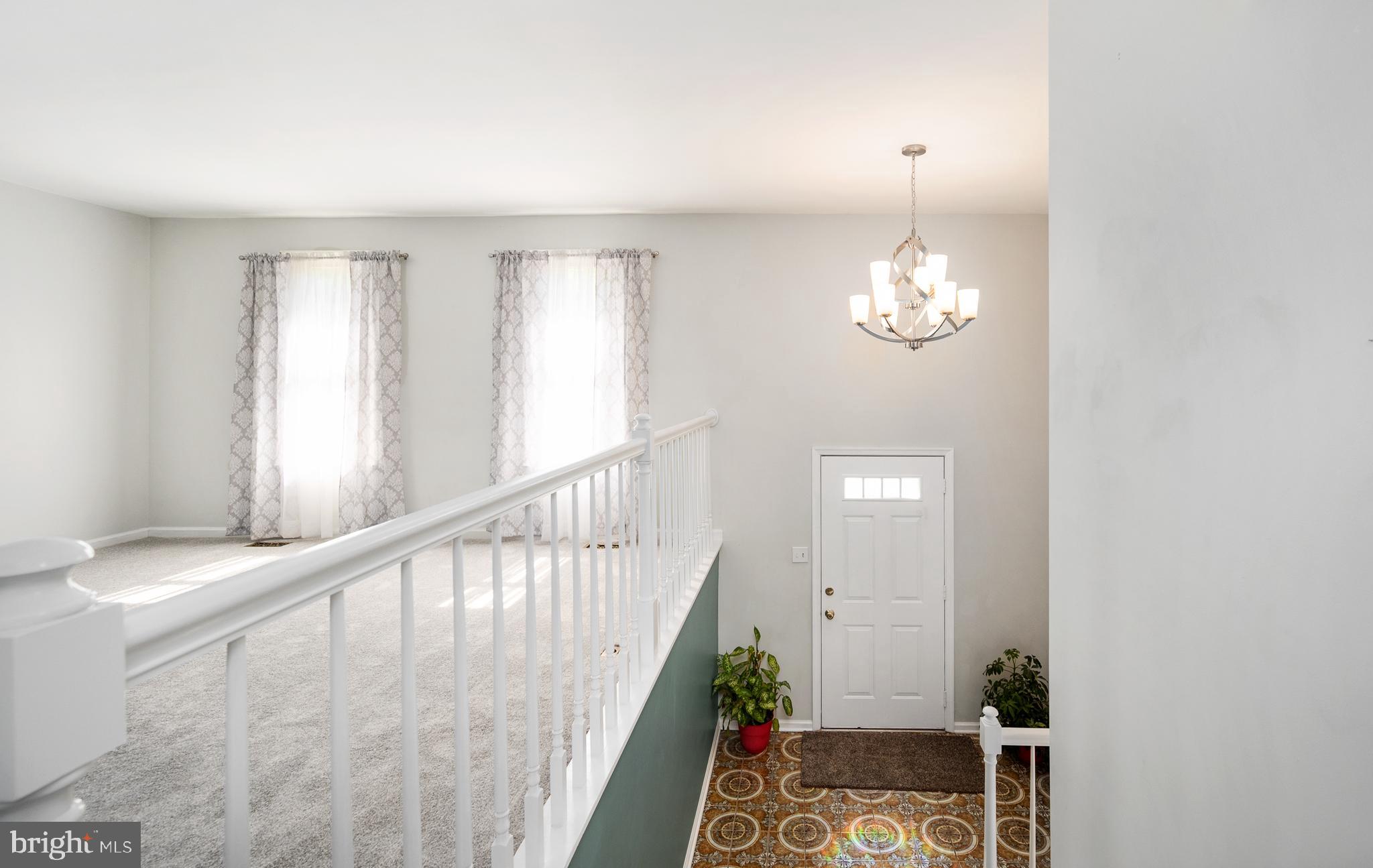 8202 Rushing Creek Drive Springfield, VA 22153 - Photo 6 of 44 View from living room to front door