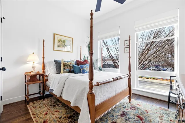 a bedroom with furniture and a window