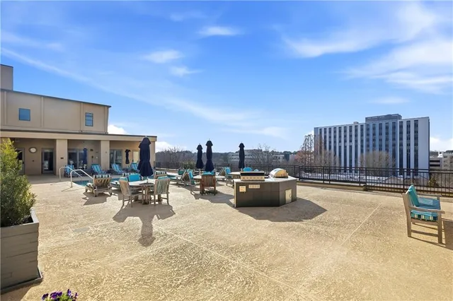 a view of a swimming pool and lounge chair