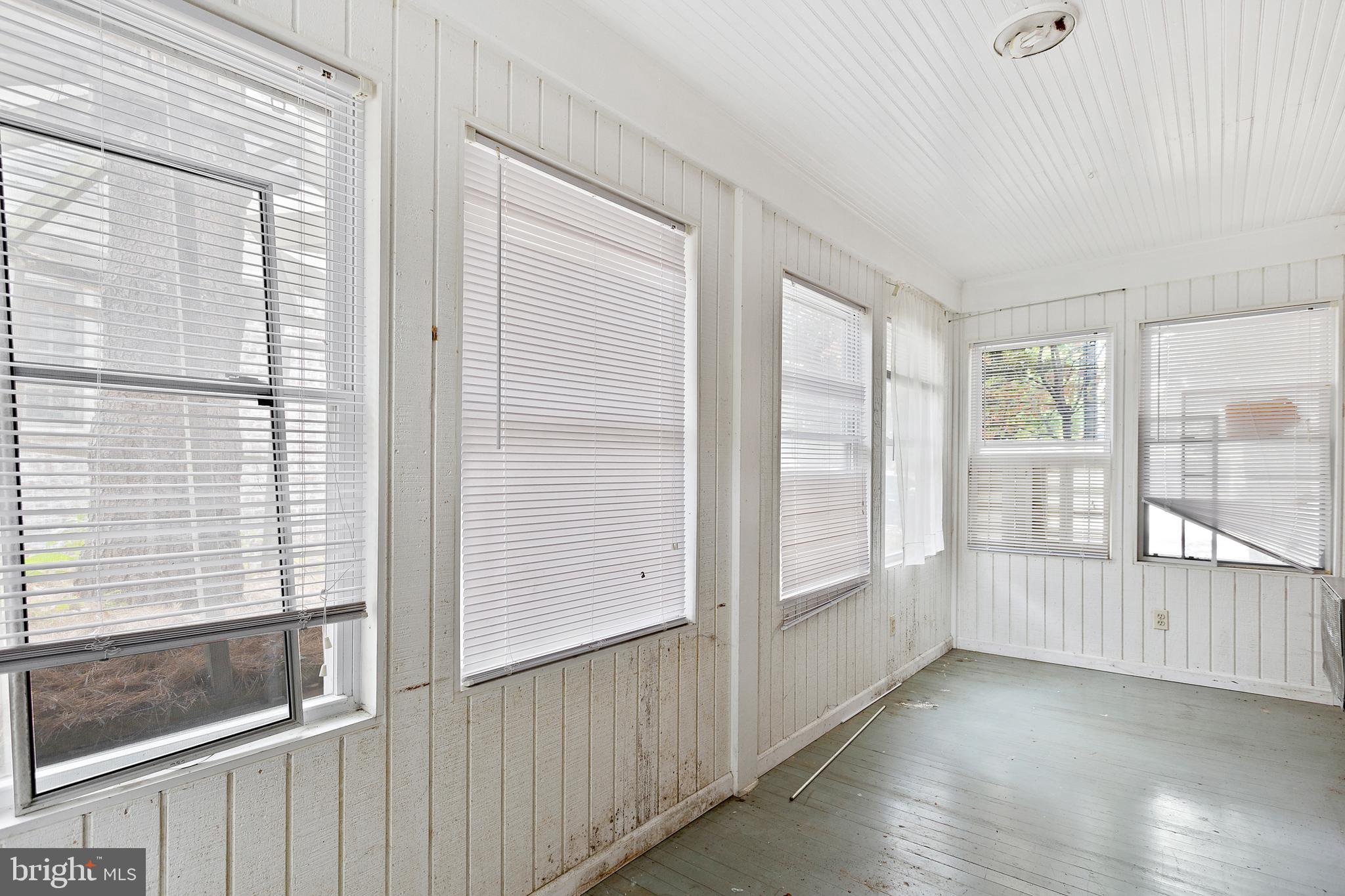 5913 Rolston Road Bethesda, MD 20817 - Photo 17 of 37 a view of an empty room with a window
