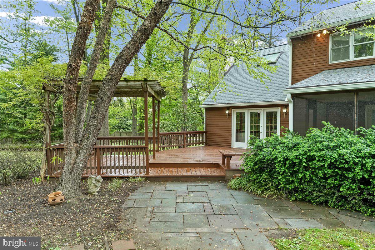 1750 Stocton Road Jenkintown, PA 19046 - Photo 45 of 50 Serene deck nestled in nature's embrace.