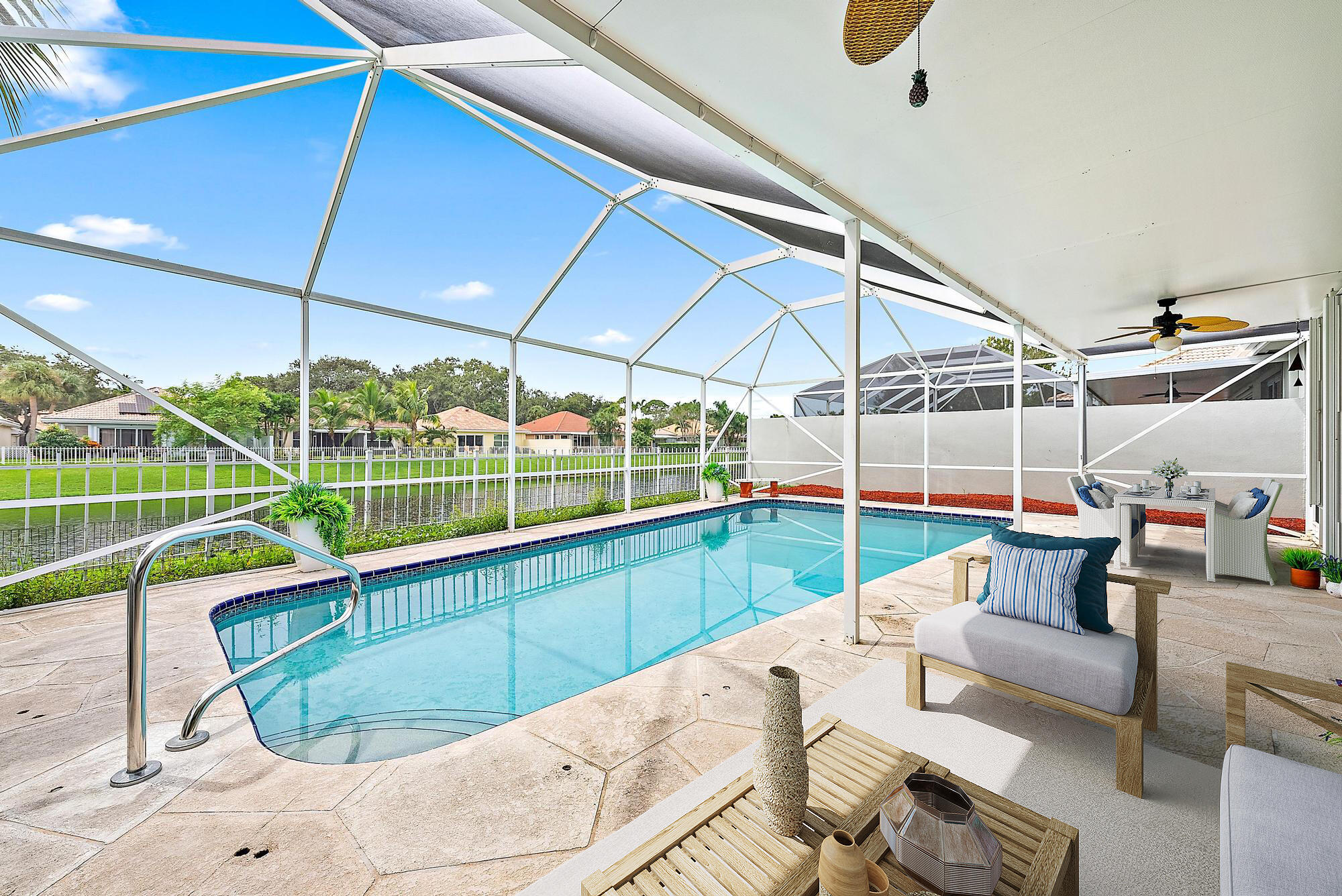 115 South Hampton Drive Jupiter, FL 33458 - Photo 12 of 27 a view of a swimming pool with a patio